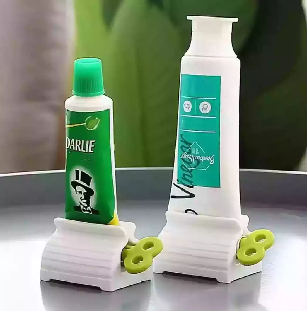 عصارة معجون الاسنان، انبوب دوار على شكل حرف ايروفامي بتصميم عمودي يوضع على شكل م